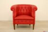 Fauteuil classique avec de hauts pieds en bois
