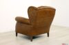 Dossier du fauteuil bergère avec oreilles en cuir