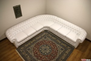 Canapé d'angle arrondi Chesterfield cuir blanc