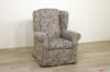 Fauteuil classique à haut dossier et oreillons
