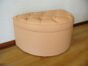 Pouf demi-cercle capitonné