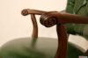 Accoudoirs de chaise en bois sculpté