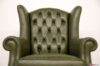 Dossier haut du fauteuil bergère capitonné