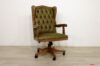 Fauteuil de bureau en cuir vert et bois de noyer clair