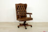 Fauteuil de bureau en cuir brun et bois