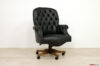 Fauteuil de bureau classique en cuir noir capitonné