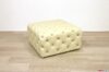 Pouf en cuir rembourré