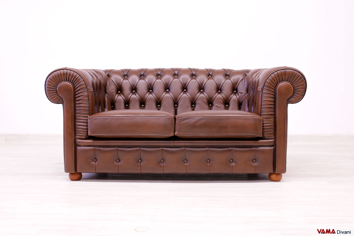Canapé Chesterfield 2 places en cuir marron en offre